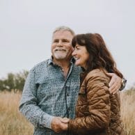 Mature couple holding hands in nature